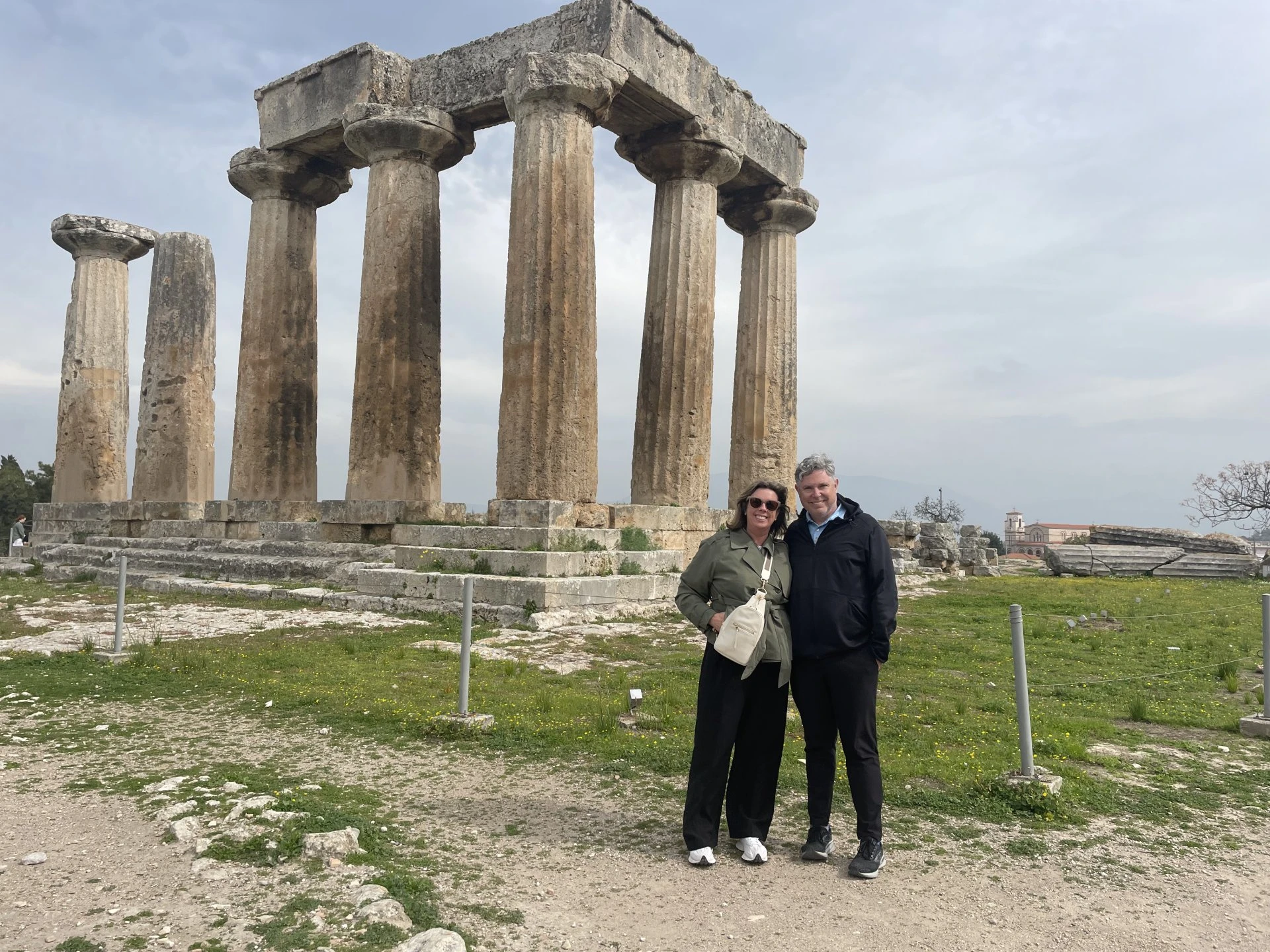 two people in front of the temple of posena