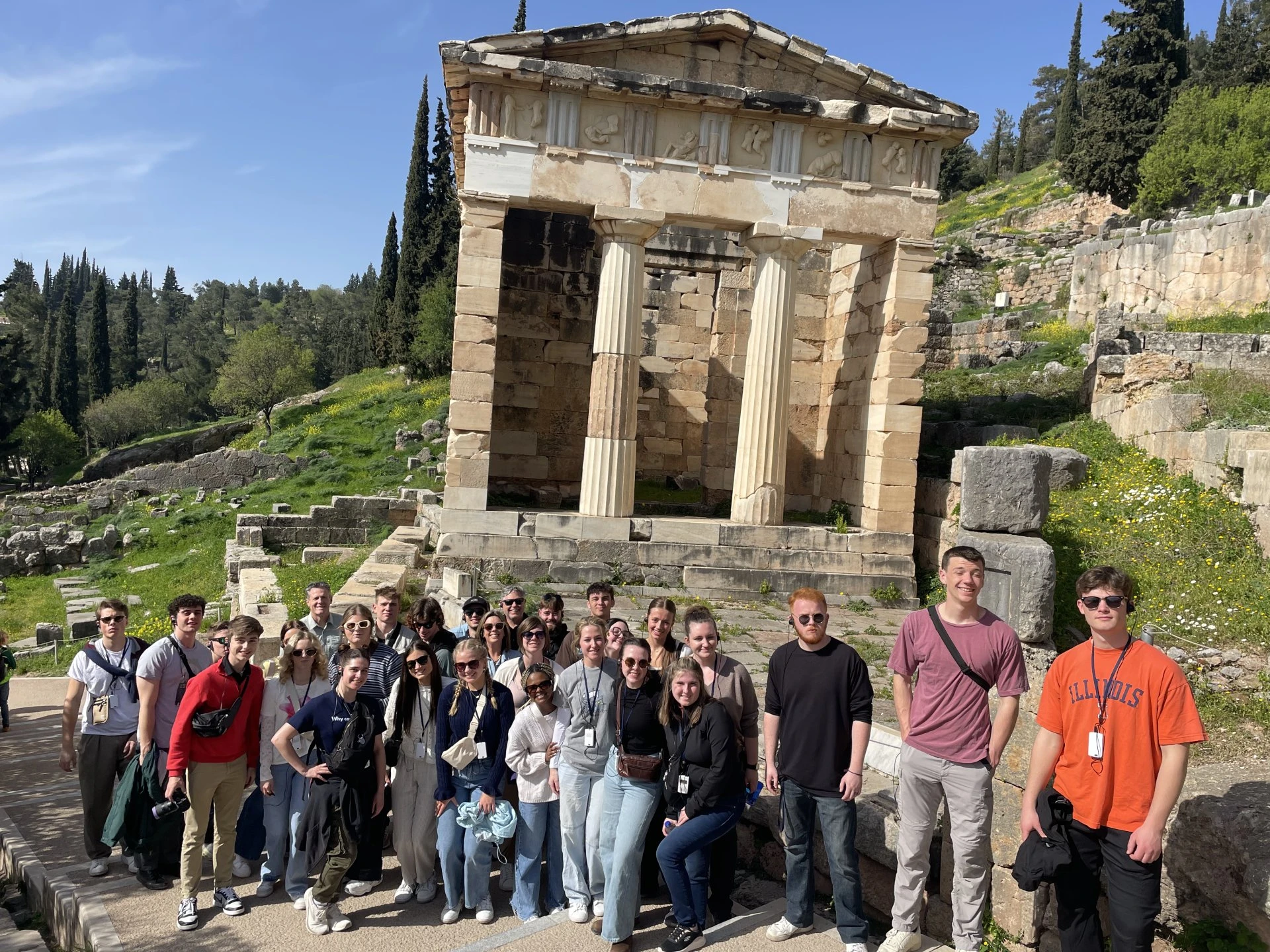 a crowd of people standing in front of a building