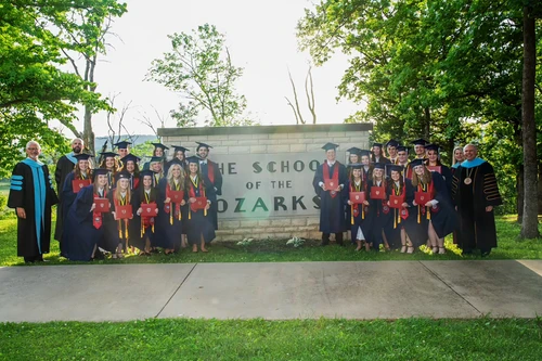 Group of graduates outside 