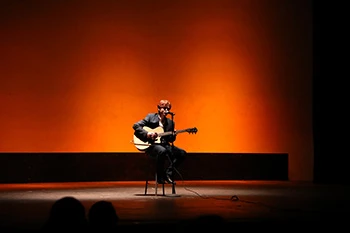 Man playing guitar. 