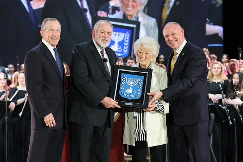 Herschend’s award includes a student-made, stained-glass piece, depicting a traditional menorah used over the Jewish holiday, Hanukkah. 