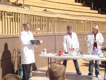 Students and professors participating in a Chemistry show at Silver Dollar City
