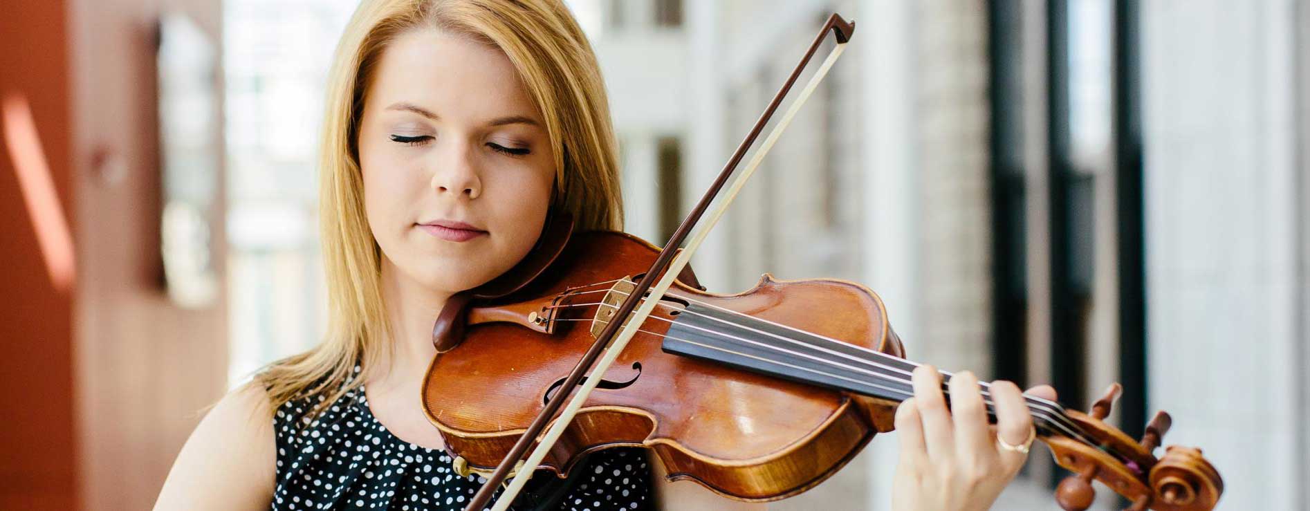 Student Playing a violin