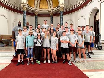 Students gather in front of the Hope Center dome