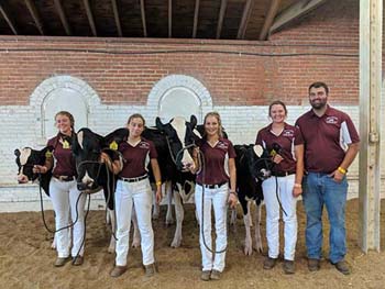 Students with dairy cows