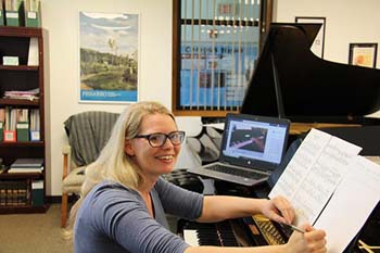 Dr. Clara Christian – Remote Learning: Dr. Clara Christian, associate professor of music, teaches one-on-one piano lessons online.