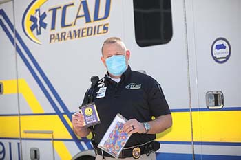 C of O delivers 100 handmade “Mynette’s Legacy Masks” to the local TCAD in Hollister, Missouri. Additional deliveries are planned for the Branson fire and police departments and Cox Medical Center. Jeff Hawkins, EMT-P and deputy chief of operations, receives the gift of masks from College of the Ozarks.