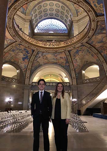 Nate Hankins, junior journalism major, and Avery Reed, junior journalism major, at the Missouri State Capitol, working on a story regarding proposed legislation affecting the college.