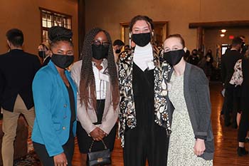 A group of students socialize after one of the plenary sessions in The Keeter Center at College of the Ozarks.