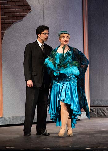 Christian Belcher, as Mr. Boddy, performs alongside Anna Brayman, as Mrs. Peacock, in “Clue the Musical.”