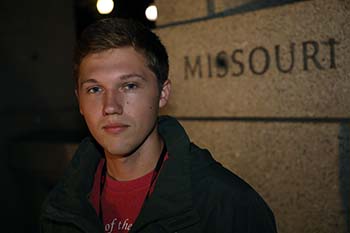 Senior Tanner Maasen, computer information science major from Freeburg, Missouri, reflects at the World War II Memorial on the National Mall in DC. 