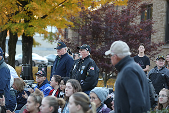 Ozark Veterans observe the Veterans Day Flag Raising Sunrise Service. (Photo by Shann Swift)