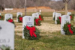College of the Ozarks staff lay wreaths in Springfield National Cemetery to honor fallen Veterans. 