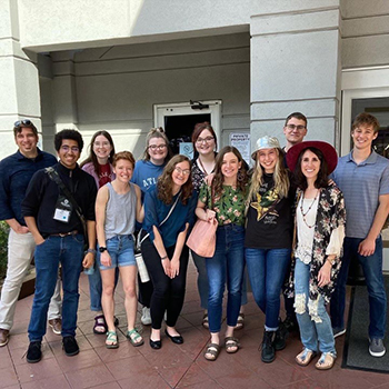 The members of the C of O Sigma Tau Delta chapter attending the four-day National Conference alongside club sponsors Dr. Charity Gibson, associate professor of English, and Dr. David Pedersen, assistant professor of Humanities. Back row, left to right: Dr. David Pedersen, senior Julia Giesey, senior Heaven Fisher, senior Jenna Carey, junior Michael Thompson, freshman Ian Hearn. Front row, left to right: senior Ty Robinson, senior Abigayle Money, sophomore Bonnie Van Wormer, senior Abby Vance, junior Verve Reposar, Dr. Charity Gibson. 