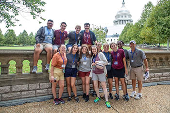 Students on the trip stop for photos outside the United States Capitol Building.