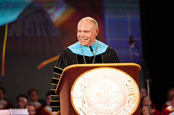 Dr. Brad Johnson gives presidential address during the Oct. 13 ceremony.