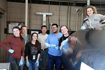 Students participate in service projects across campus, including cleaning the dairy barn, during freshman orientation, known as Character Camp, at College of the Ozarks Jan. 2-8.