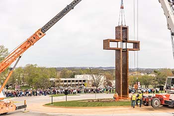 College of the Ozarks installs a 40-foot sculpture, “The Empty Cross” TM, in the entrance of campus today, in time for Easter weekend